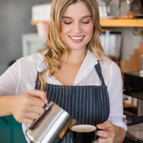 Woman pouring coffee